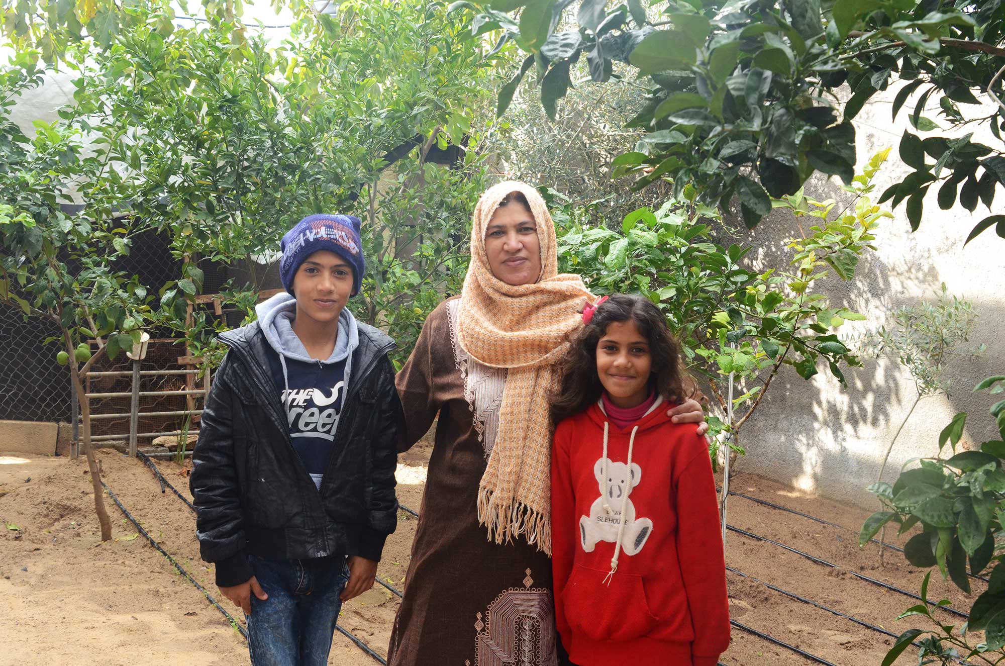 Access to Gaza water network helps Hanan keep her livestock business alive and care for her family. They used to go for many days without water.