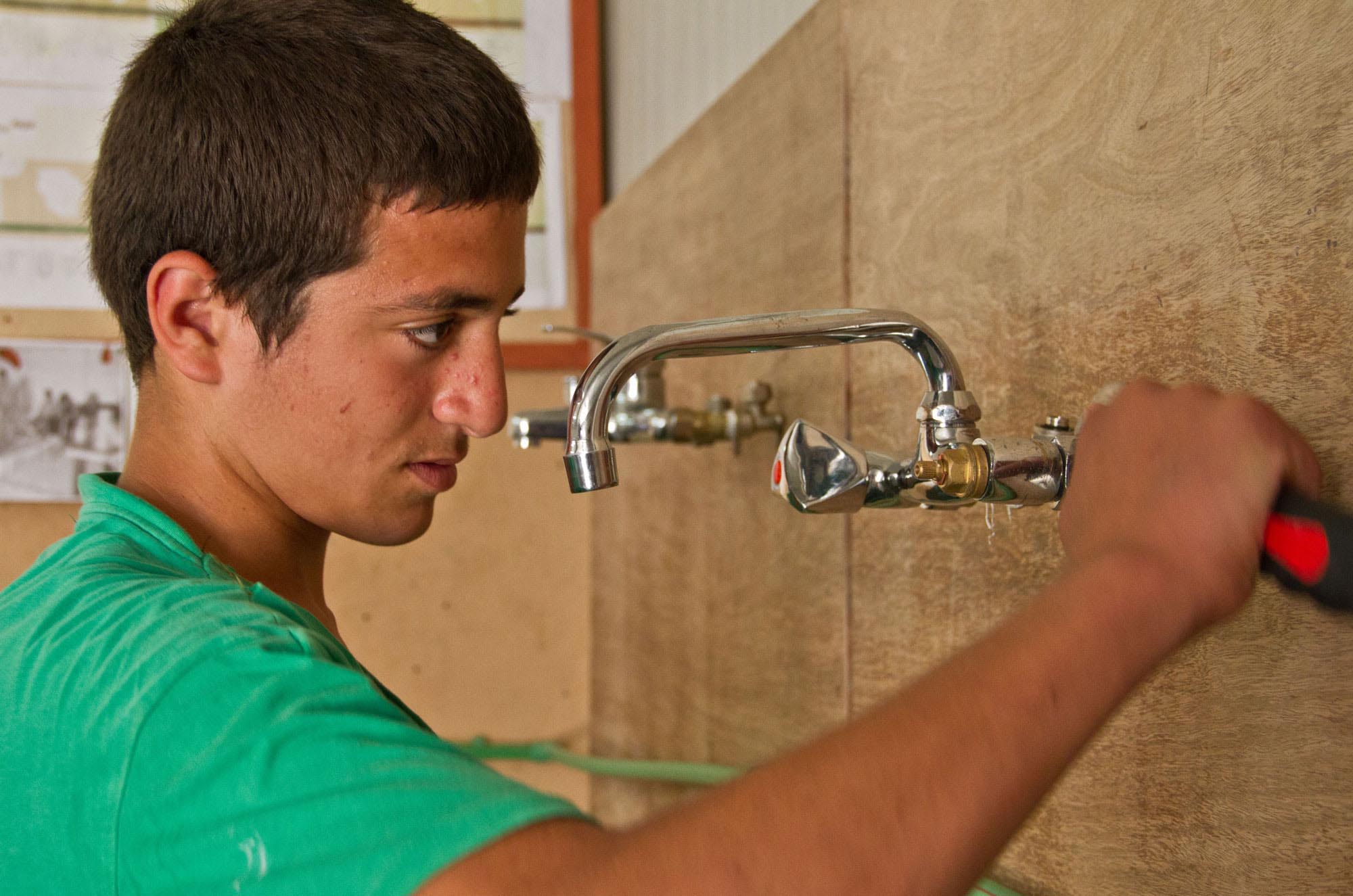 Anera’s vocational training and education program gives Palestinians, like this aspiring plumber, a chance to enroll in accredited institutions and increase their employability.