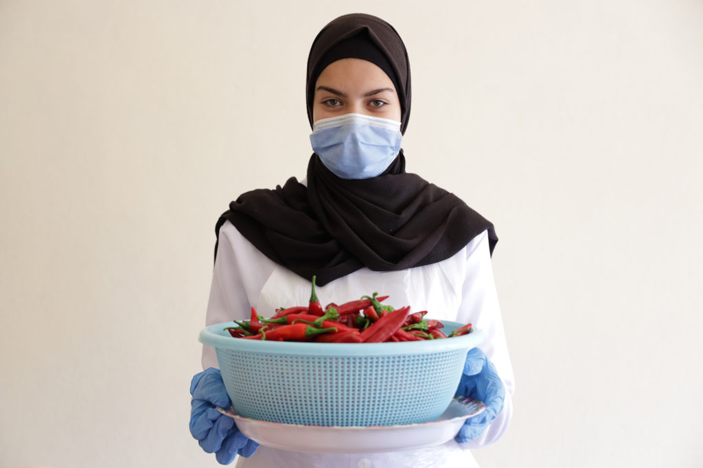 Aya, 16-year-old from Syria and participant in a cooking course in Bint Jbeil.