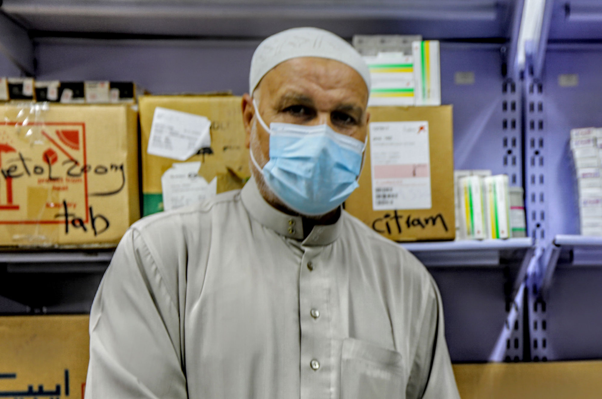 Mohamed in the pharmacy at Shifa Hospital.